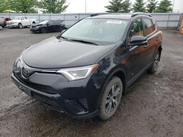Photo 2 from auction – 2018 TOYOTA RAV4 LE with VIN 2T3BFREV8JW749528