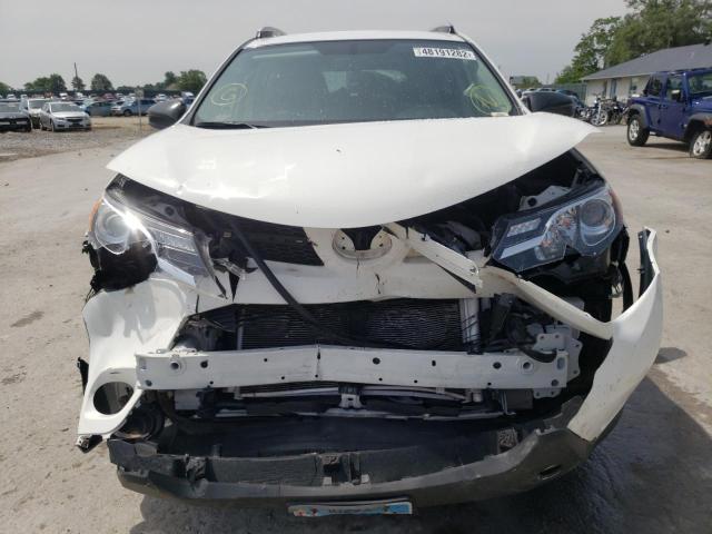 Photo 9 from auction – 2015 TOYOTA RAV4 LE with VIN JTMBFREV7FJ040451