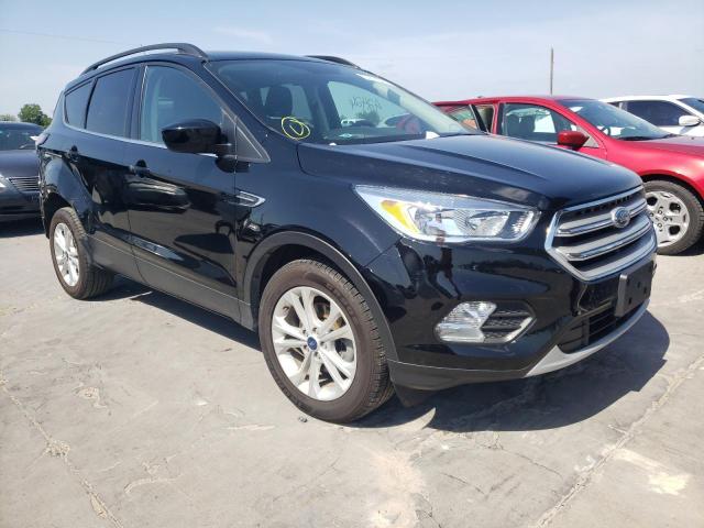FORD ESCAPE SE 2018 with VIN 1FMCU0GD0JUD35064 - Photo from auction