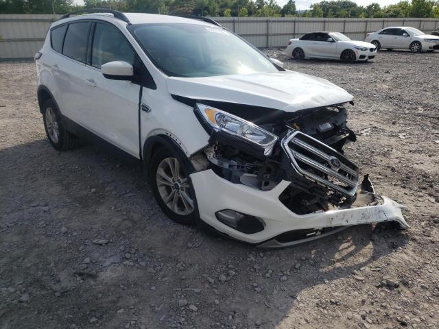 FORD ESCAPE SE 2018 with VIN 1FMCU9G98JUC13679 - Photo from auction