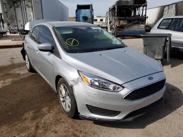 FORD FOCUS SE 2018 with VIN 1FADP3F2XJL211557 - Photo from auction