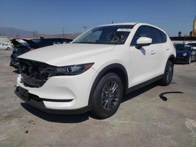 Photo 2 from auction – 2021 MAZDA CX-5 TOURI with VIN JM3KFBCM9M1448648