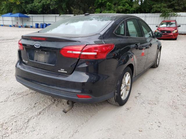 Photo 4 from auction – 2015 FORD FOCUS SE with VIN 1FADP3F23FL214338