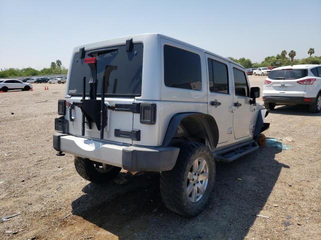 Photo 4 from auction – 2011 JEEP WRANGLER U with VIN 1J4BA7H1XBL607000