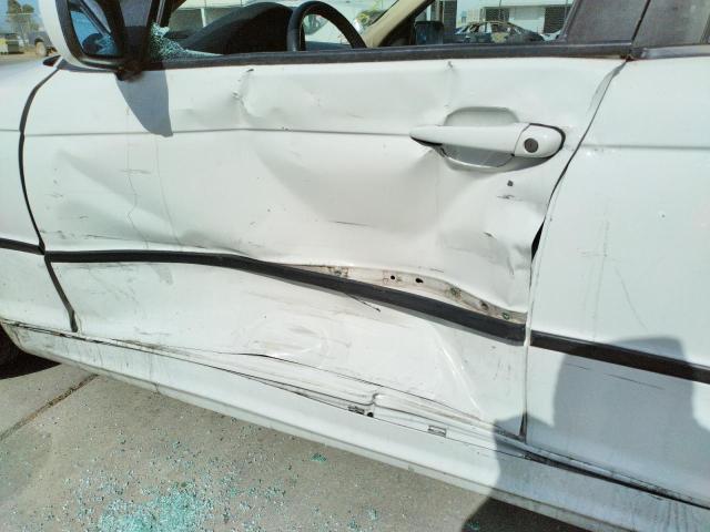 Photo 9 from auction – 2004 BMW 325 IS SUL with VIN WBAAZ33464KP88588