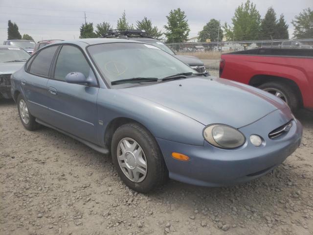 FORD TAURUS 1999 with VIN 1FAFP53S6XG319832 - Photo from auction
