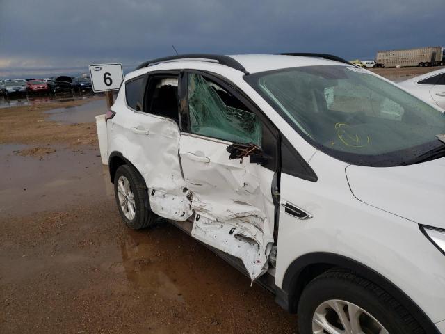 Photo 9 from auction – 2017 FORD ESCAPE SE with VIN 1FMCU0GDXHUF07174