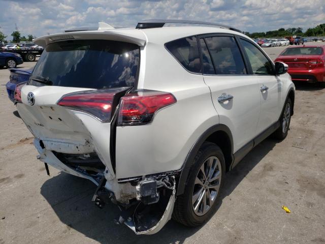 Photo 4 from auction – 2018 TOYOTA RAV4 LIMIT with VIN JTMYFREV7JD126263