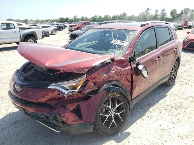 Photo 2 from auction – 2018 TOYOTA RAV4 SE with VIN JTMNFREV6JD125754