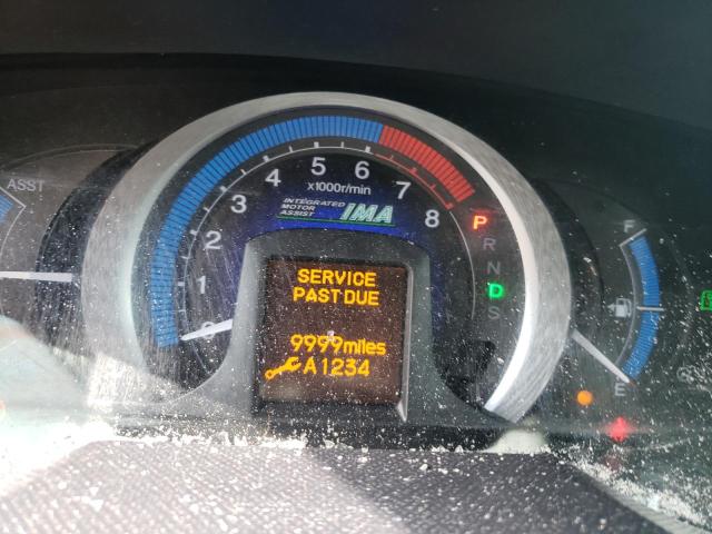 Photo 8 from auction – 2010 HONDA INSIGHT EX with VIN JHMZE2H77AS000457