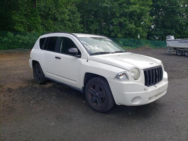 JEEP COMPASS SP 2009 with VIN 1J4FF47B39D118051 - Photo from auction