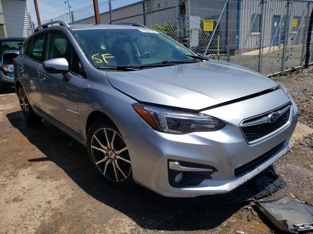 SUBARU IMPREZA 2017 with VIN 4S3GTAU61H3739933 - Photo from auction