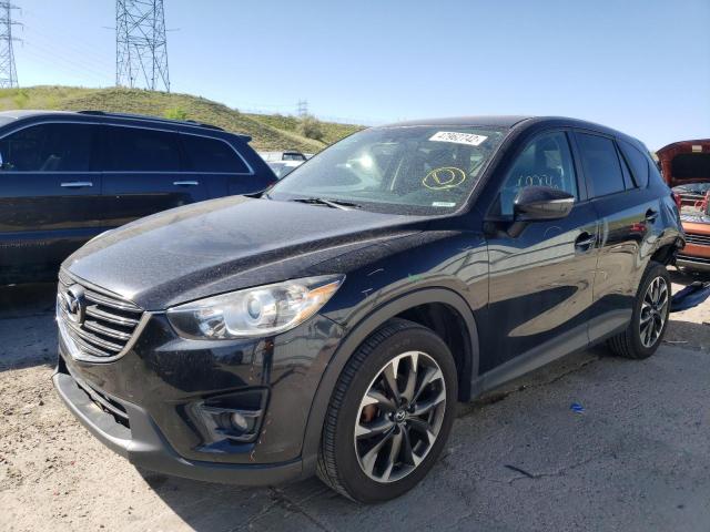 Photo 2 from auction – 2016 MAZDA CX-5 GT with VIN JM3KE4DY8G0744688