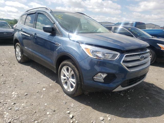 FORD ESCAPE SE 2018 with VIN 1FMCU9GD0JUC40475 - Photo from auction