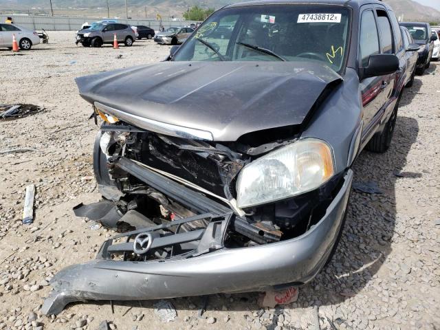 Photo 10 from auction – 2002 MAZDA TRIBUTE LX with VIN 4F2YU09142KM42032