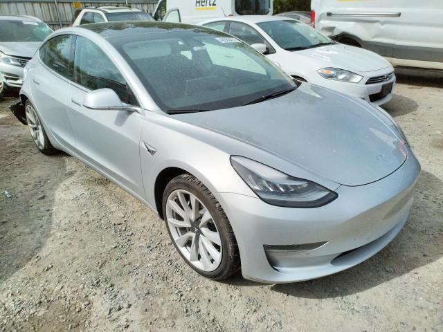 TESLA MODEL 3 2018 with VIN 5YJ3E1EA2JF017911 - Photo from auction
