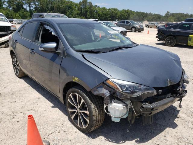 TOYOTA COROLLA L 2017 with VIN 5YFBURHE7HP701993 - Photo from auction