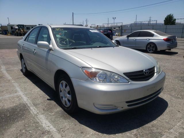 TOYOTA CAMRY LE 2004 with VIN 4T1BE32K14U879691 - Photo from auction