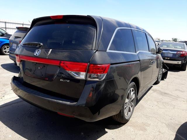 Photo 4 from auction – 2014 HONDA ODYSSEY TO with VIN 5FNRL5H95EB094397
