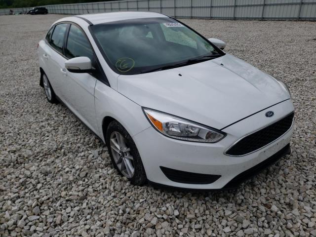 FORD FOCUS SE 2015 with VIN 1FADP3F28FL248677 - Photo from auction