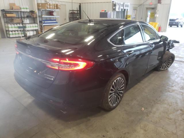 Photo 4 from auction – 2018 FORD FUSION TIT with VIN 3FA6P0RU4JR181803