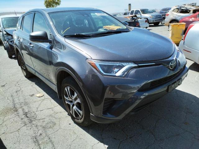 TOYOTA RAV4 LE 2018 with VIN JTMBFREV3JJ738077 - Photo from auction