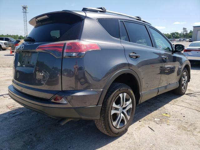 Photo 4 from auction – 2018 TOYOTA RAV4 LE with VIN JTMZFREV0JJ723065