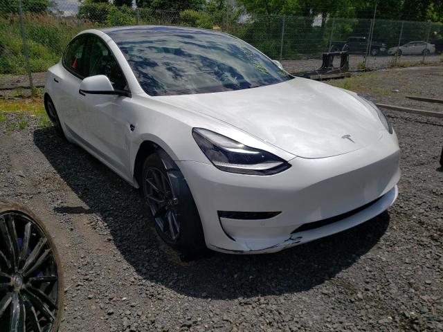 TESLA MODEL 3 2021 with VIN 5YJ3E1EB0MF063248 - Photo from auction