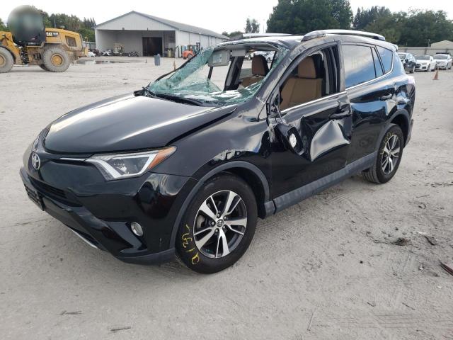 Photo 2 from auction – 2016 TOYOTA RAV4 XLE with VIN 2T3WFREV4GW245925