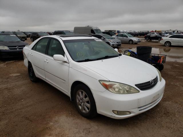 TOYOTA CAMRY LE 2003 with VIN 4T1BF32K83U054291 - Photo from auction