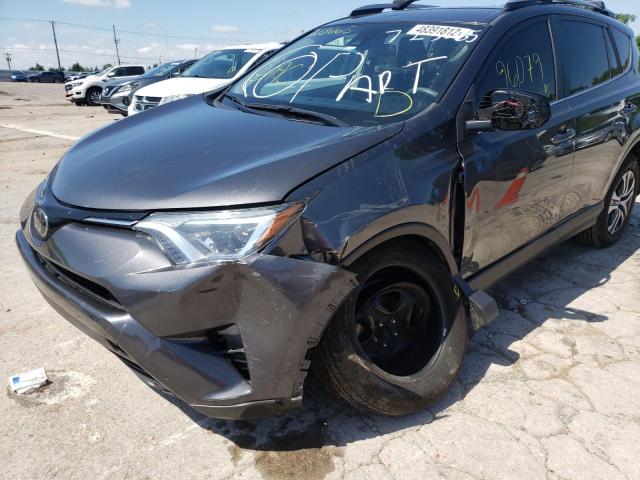Photo 9 from auction – 2018 TOYOTA RAV4 LE with VIN JTMZFREV0JJ723065