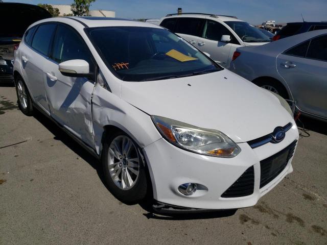 FORD FOCUS SEL 2012 with VIN 1FAHP3M28CL357415 - Photo from auction