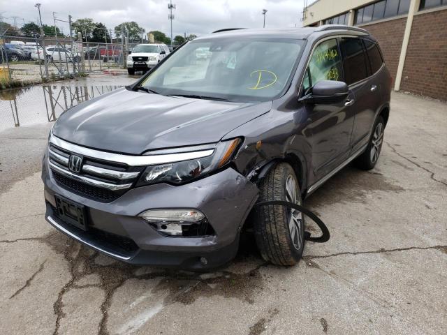 Photo 2 from auction – 2016 HONDA PILOT ELIT with VIN 5FNYF6H04GB038657