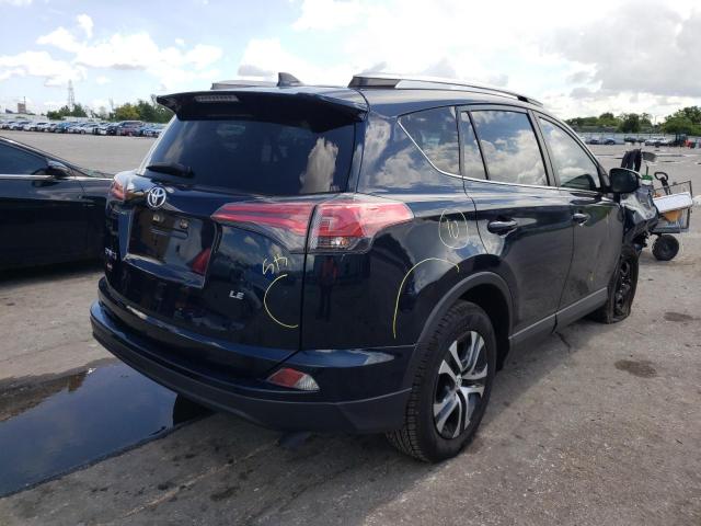 Photo 4 from auction – 2017 TOYOTA RAV4 LE with VIN JTMZFREV9HJ130041