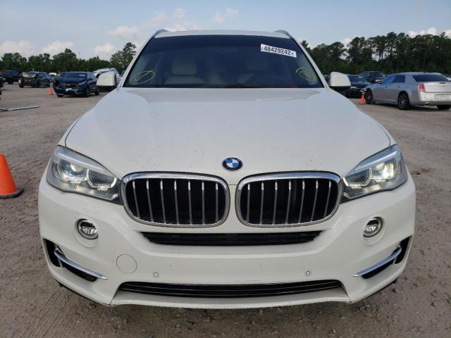 Photo 9 from auction – 2014 BMW X5 XDRIVE3 with VIN 5UXKR0C55E0C28106