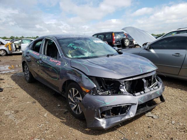 HONDA CIVIC EX 2018 with VIN 19XFC2F7XJE035137 - Photo from auction