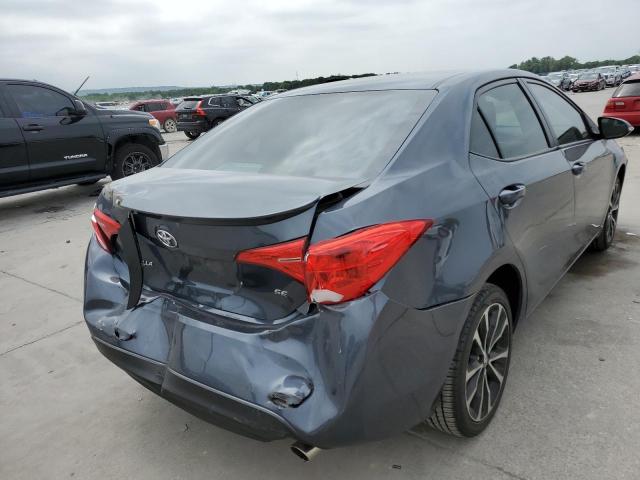 Photo 4 from auction – 2018 TOYOTA COROLLA L with VIN 5YFBURHE7JP802229