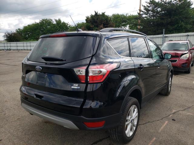 Photo 4 from auction – 2018 FORD ESCAPE SE with VIN 1FMCU9GD8JUD56751
