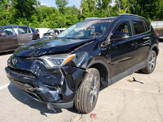 Photo 2 from auction – 2017 TOYOTA RAV4 XLE with VIN 2T3RFREV5HW611034