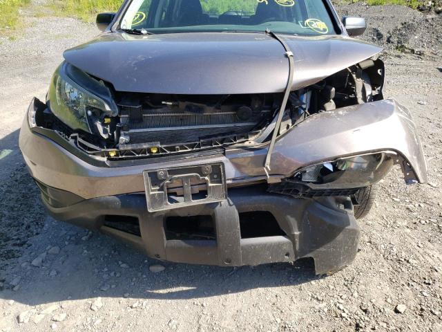 Photo 9 from auction – 2014 HONDA CR-V LX with VIN 2HKRM4H37EH640119