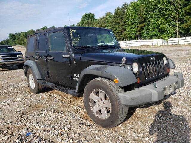 JEEP WRANGLER U 2009 with VIN 1J4GB391X9L738674 - Photo from auction