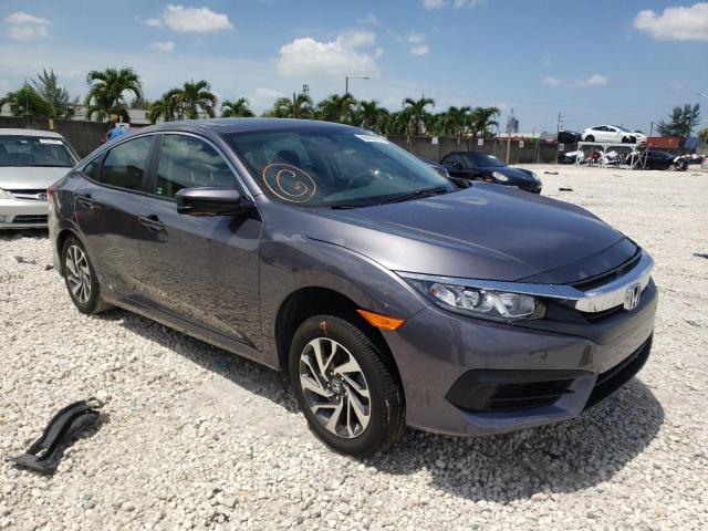 HONDA CIVIC EX 2018 with VIN 19XFC2F78JE036500 - Photo from auction