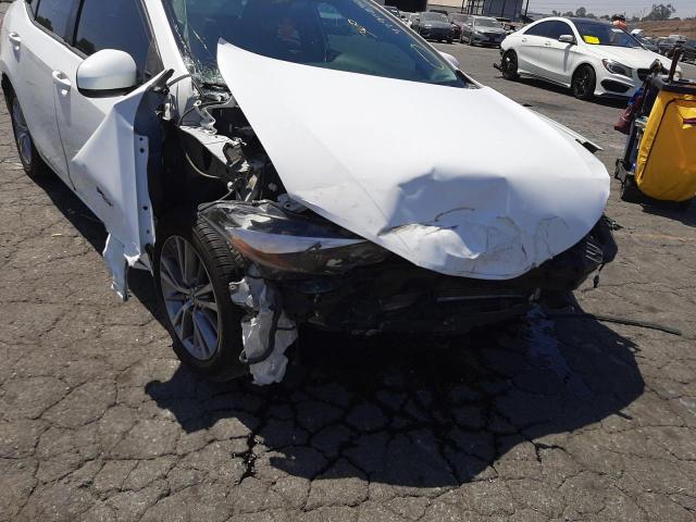 Photo 9 from auction – 2014 TOYOTA COROLLA L with VIN 5YFBURHE6EP067166