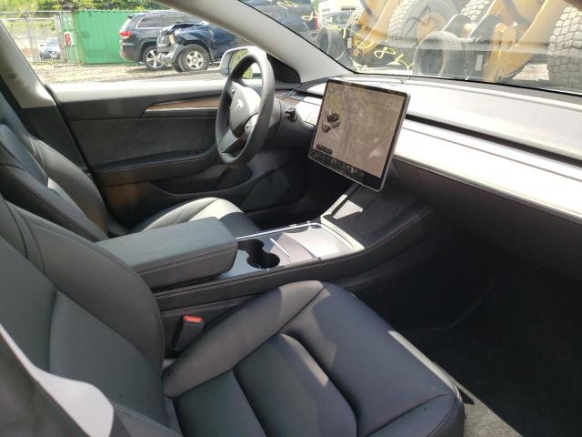 Photo 5 from auction – 2021 TESLA MODEL 3 with VIN 5YJ3E1EB0MF063248