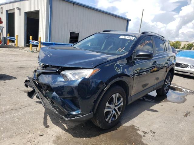 Photo 2 from auction – 2017 TOYOTA RAV4 LE with VIN JTMZFREV9HJ130041