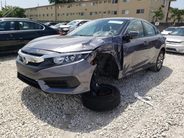 Photo 2 from auction – 2018 HONDA CIVIC EX with VIN 19XFC2F78JE036500