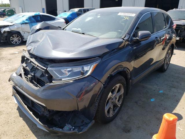 Photo 2 from auction – 2017 HONDA CR-V EXL with VIN 7FARW1H84HE015804