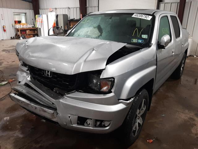 Photo 2 from auction – 2014 HONDA RIDGELINE with VIN 5FPYK1F64EB012991