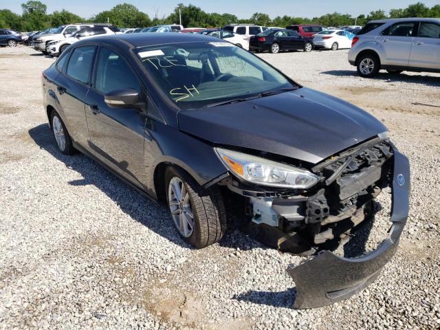 FORD FOCUS SE 2015 with VIN 1FADP3F24FL329319 - Photo from auction