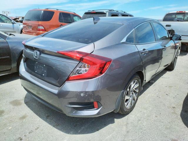 Photo 4 from auction – 2018 HONDA CIVIC EX with VIN 19XFC2F74JE011271